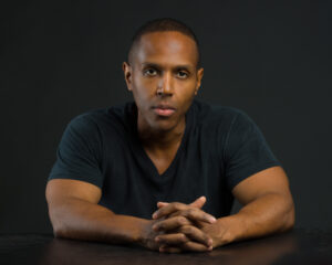 Low key headshot for African-American film actor-producer.
