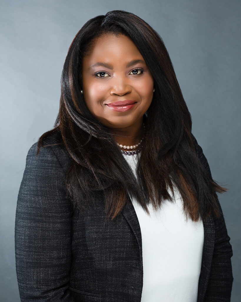 Headshot for young African-American female family law attorney.