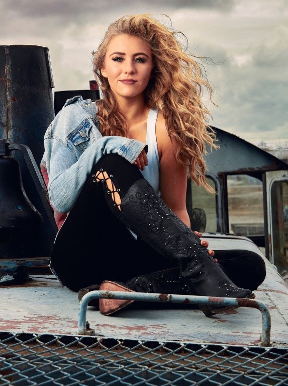 Personal branding photo for stylist/model Outdoor personal branding image for fashion stylist/model, shot on an abandoned train engine.