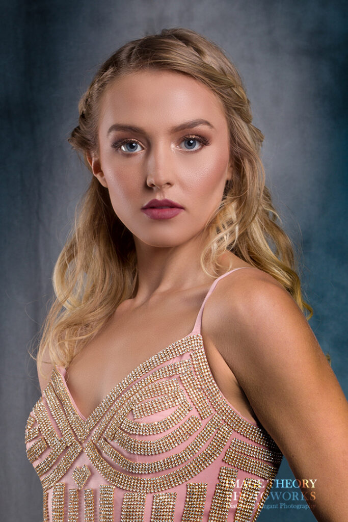 Modeling headshot of beautiful blond model in beaded evening gown.