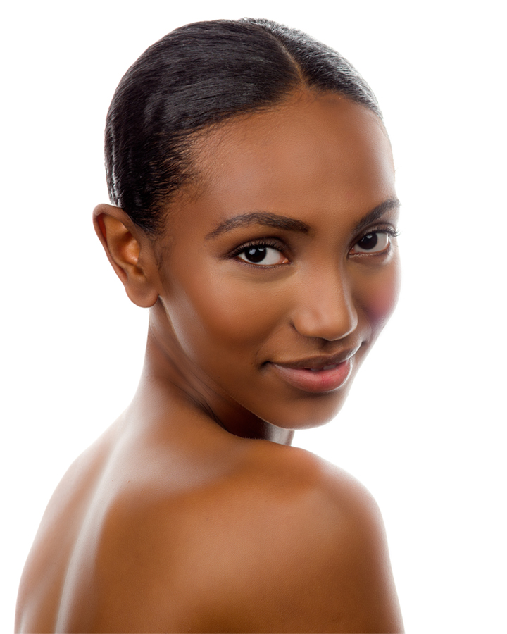 Beauty photography. A beautiful female Ethiopian model wears a natural look makeup in an ad for a cosmetics brand. Photographer Gerard Harrison, Houston, Texas. Model Tsion Bekele.