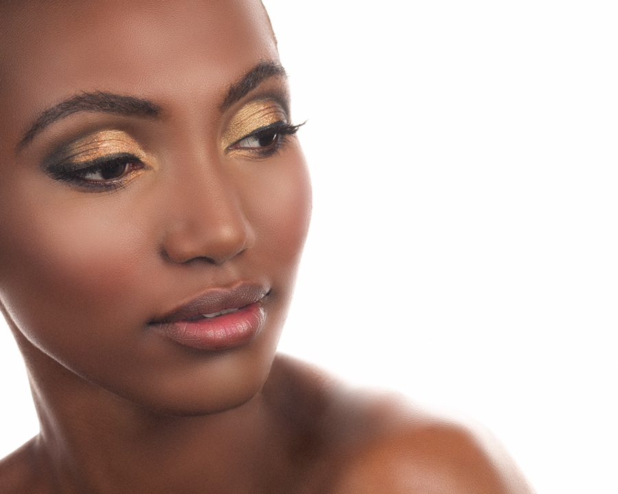 Beauty photo of beautiful Ethiopian female model in dramatic fashion makeup. Model Tsion Bekele. Gerard Harrison, Houston fashion photographer.
